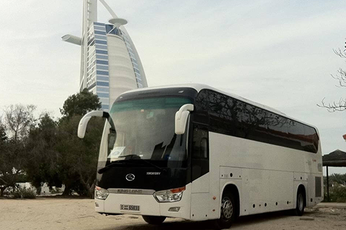 Tour bus parked in front of Burj El Arab