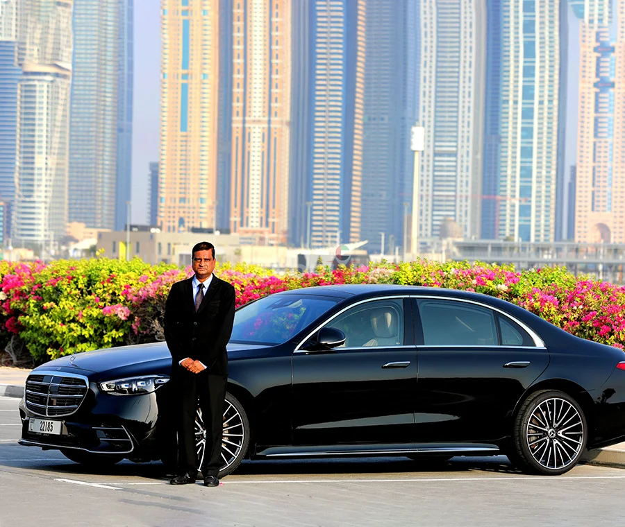 An image of Black Mercedes S-class car with private driver