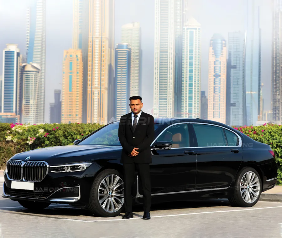 An image of Black BMW 730 Li car with private driver