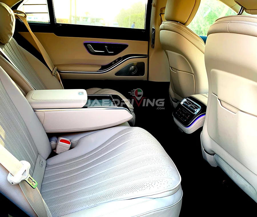 An image of Mercedes S-Class interior highlighting its plush leather seating arrangement