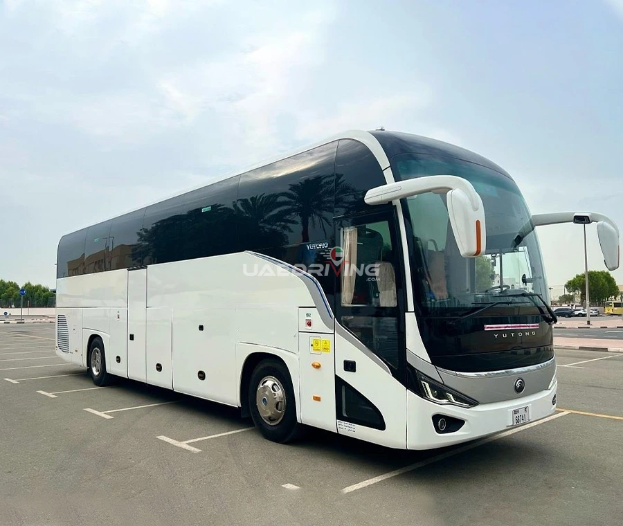Front view of a white Yutong 53 Seater bus showcasing its impressive size and elegant features