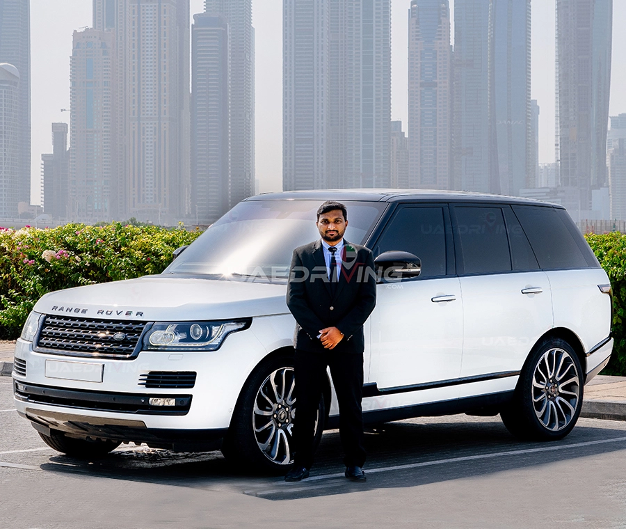 An image of white Rage Rover Vogue autobiography car with private driver