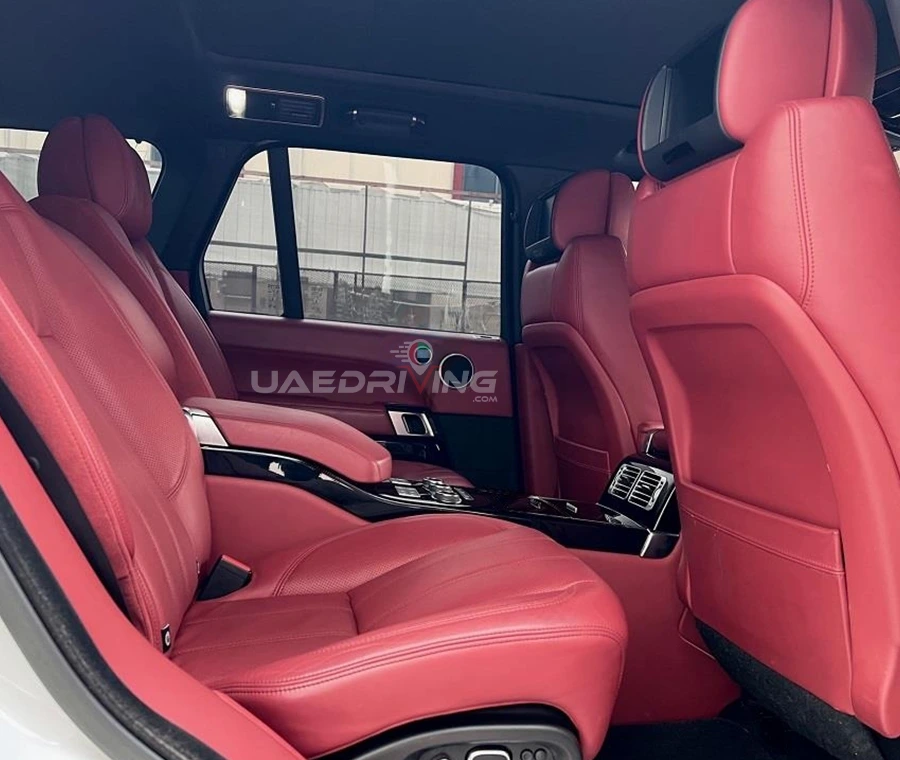 Interior of a Range rover Vogue car highlighting its advanced technology and spacious interior.