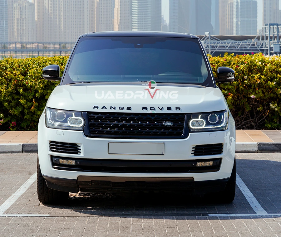 Front view of a white Range rover Vogue showcasing its superior engineering and elegance.