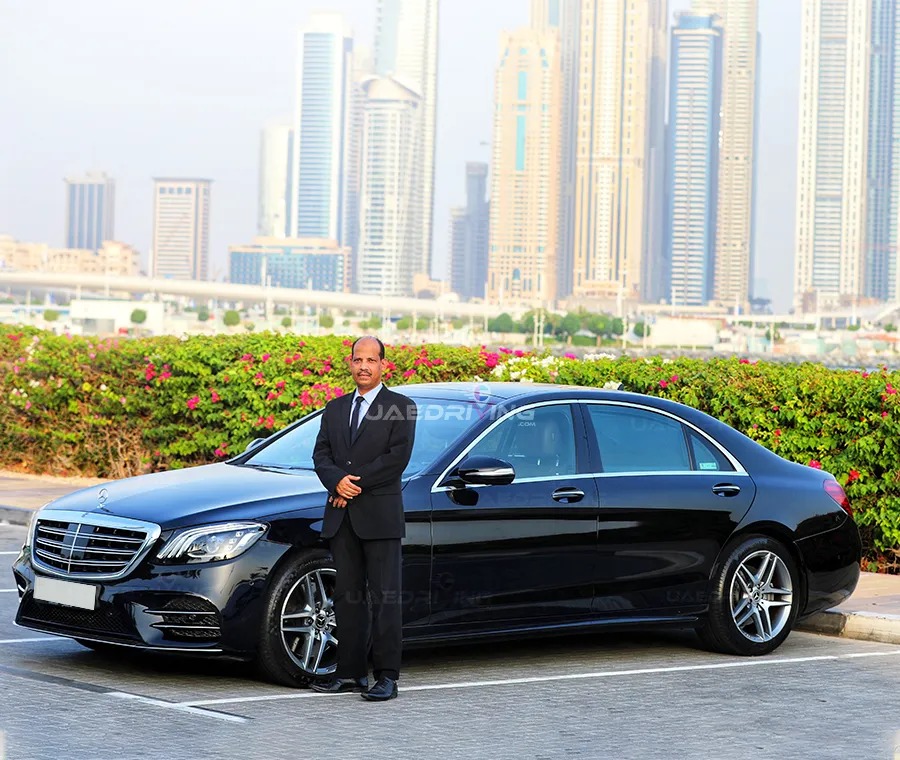An image of Black Mercedes Benz S class car with private chauffeur
