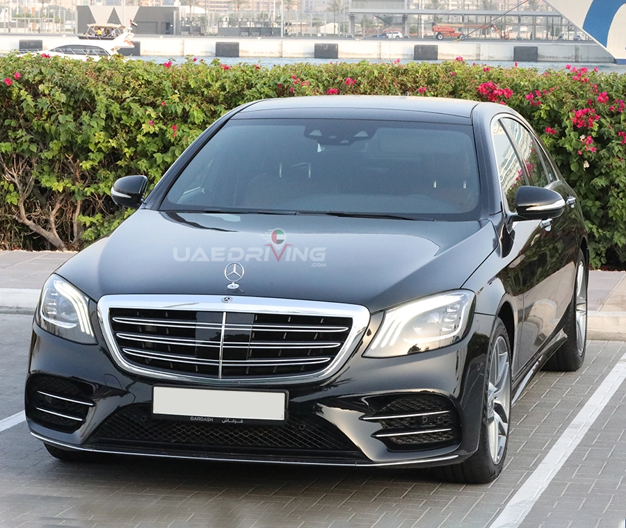 Front view image of a black Mercedes Benz S Class car showcasing its powerful design and advanced features