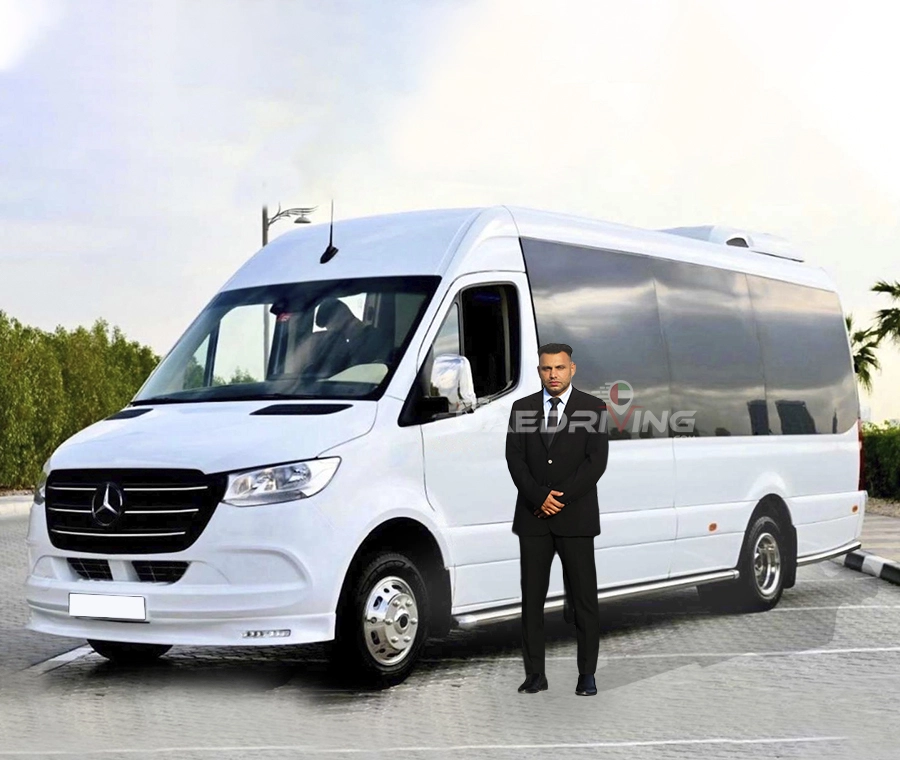 Front view of a white Mercedes Sprinter 19 Seater with private chauffeur