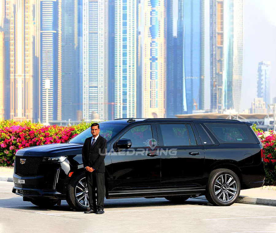 An image of black Cadillac Escalade car with private chauffeur