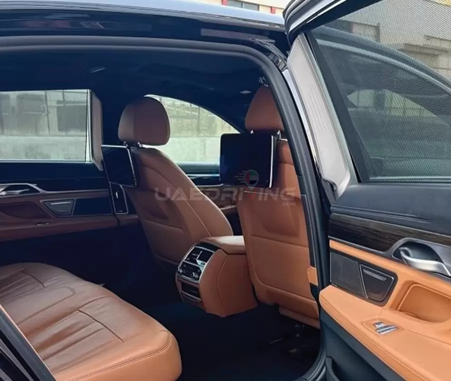 An image of the inside of BWM 730 Li car displaying its refined leather seating.